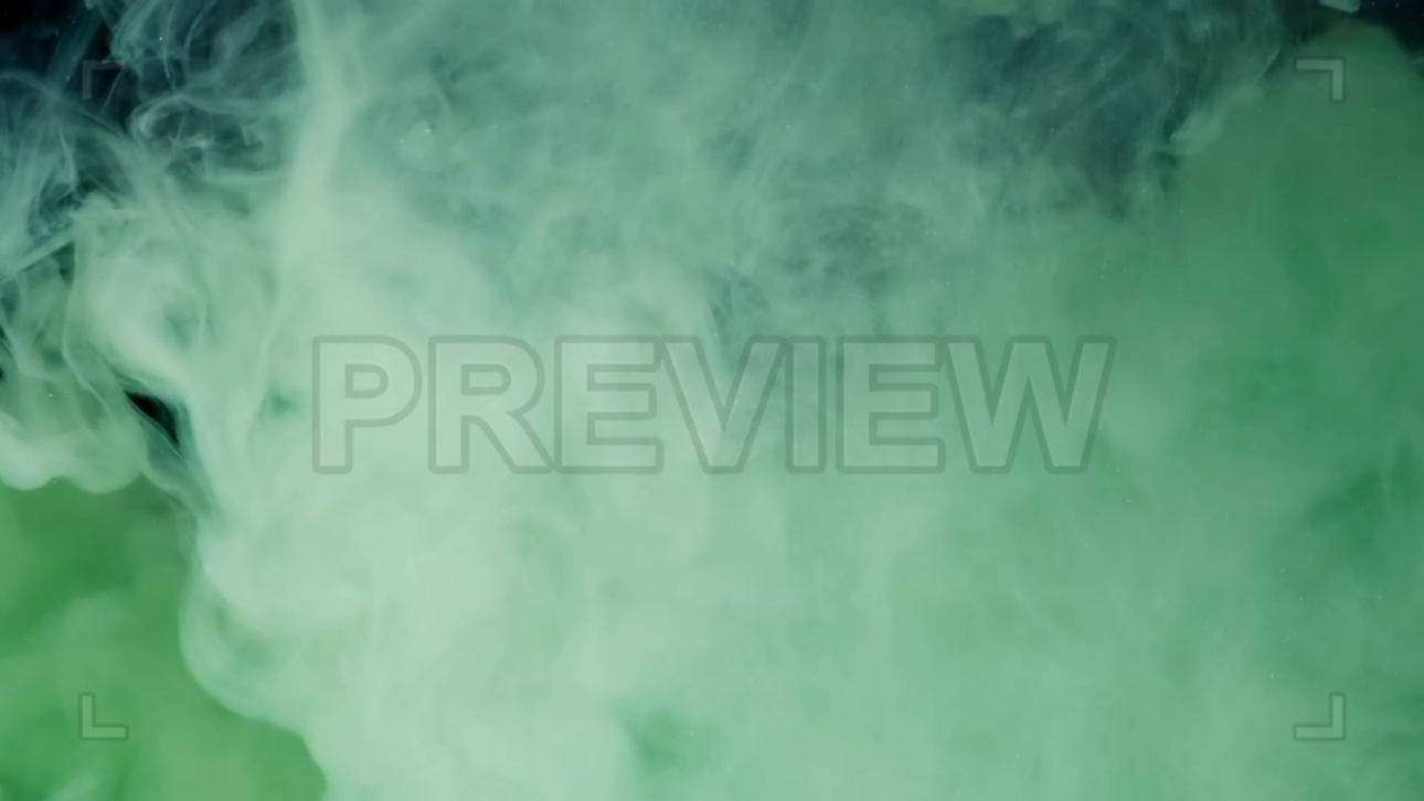Green Paint Dissolving In Water