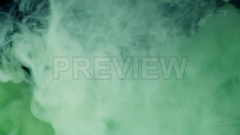 Green Paint Dissolving In Water