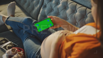 Pregnant Woman Watching A Video
